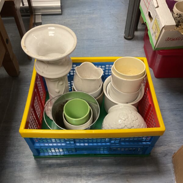 Mixed lot of assorted plant pots for garden or home.