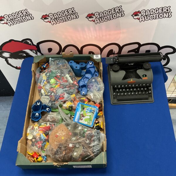 Playmobil figures and a vintage Lilliput typewriter in a mixed lot.