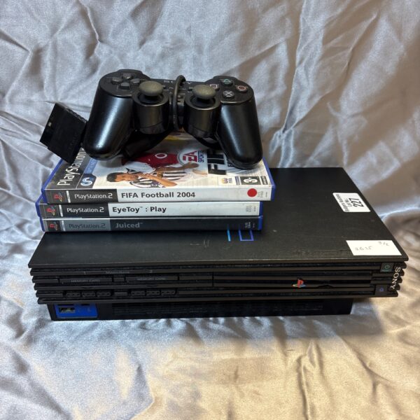 Sony PlayStation 2 console with FIFA 2004 game and controller.