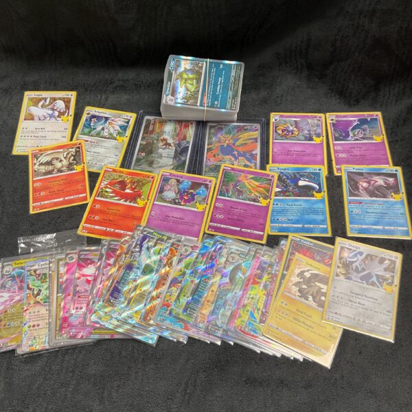 Large Pokemon card lot with full art and holo cards.