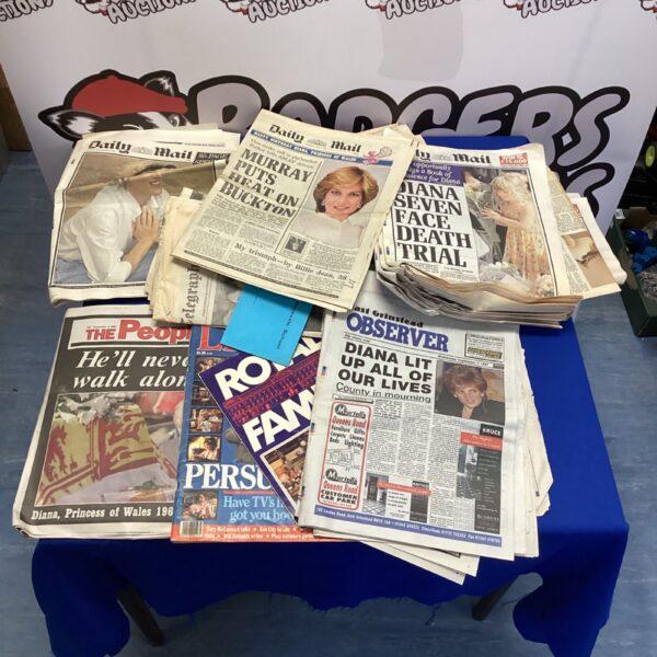 Vintage newspapers detailing Princess Diana and Royal Family events.