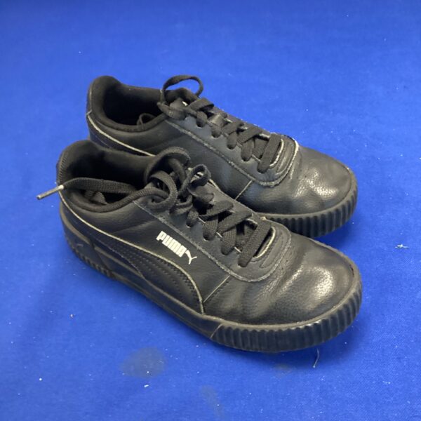 Black Puma trainers size 3, classic lace-up sports shoes.