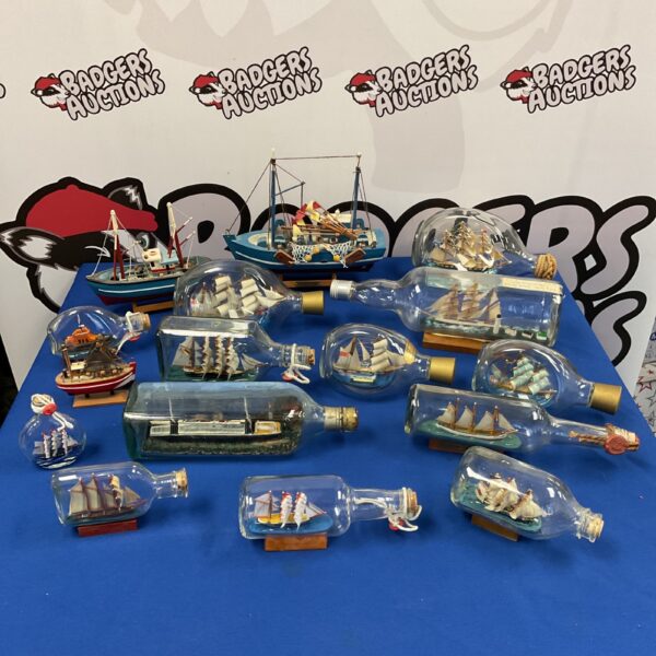 Detailed ships in bottles collection, vintage nautical decor.