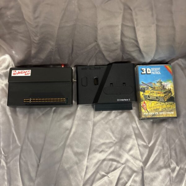 Sinclair ZX Interface 2 with Multiface One and 3D Desert Patrol game.