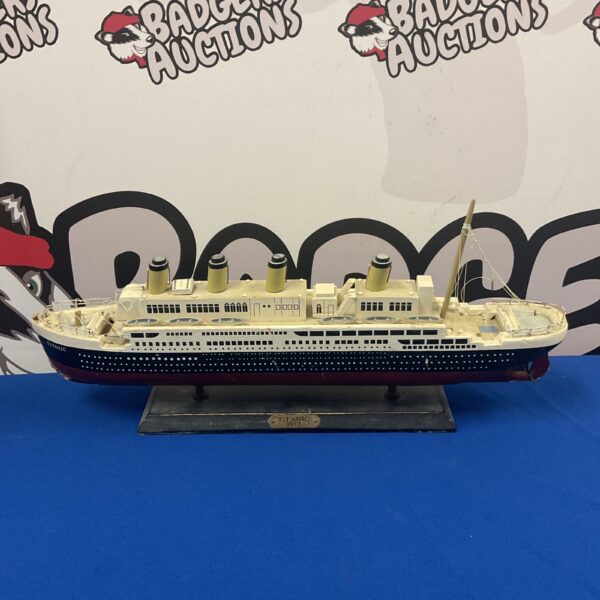 Detailed wooden Titanic model ship from 1912 for collectors.