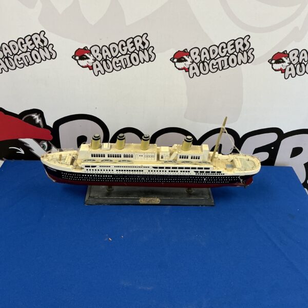 Detailed vintage Titanic model ship for collectors.