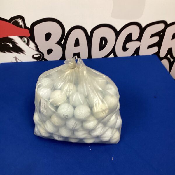 A plastic bag filled with used Top Flite golf balls.