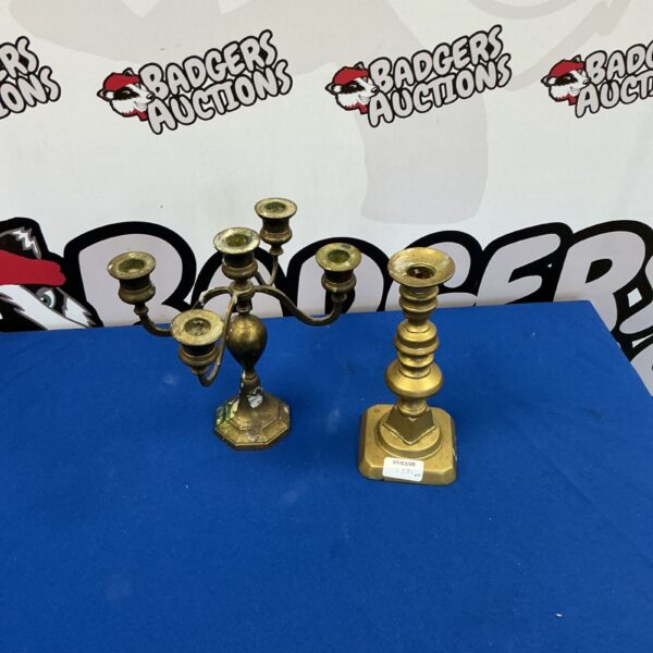 Pair of vintage brass candlesticks with fluted stems.