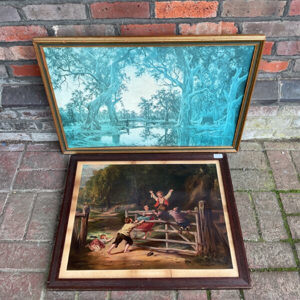 Vintage framed print of a pastoral scene with figures and a river.