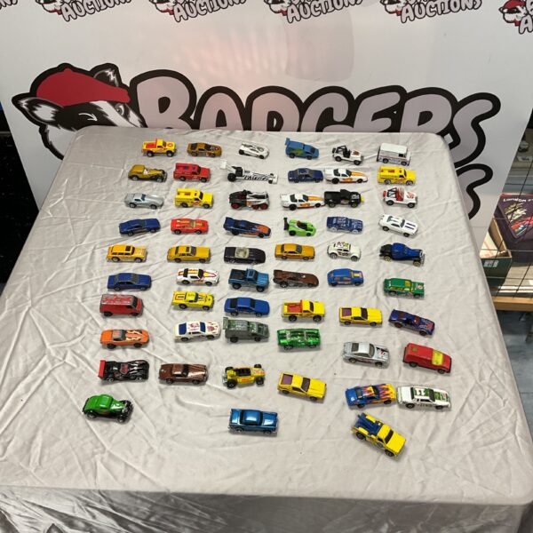 Vintage Hot Wheels cars in a collection, diecast toy cars.