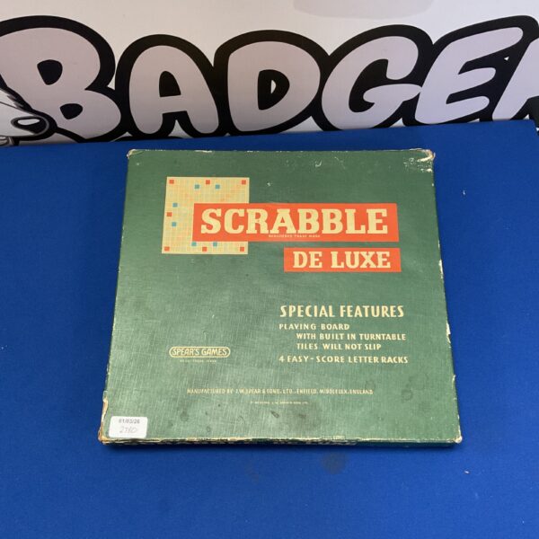 Vintage Scrabble De Luxe board game with wooden tiles and racks.