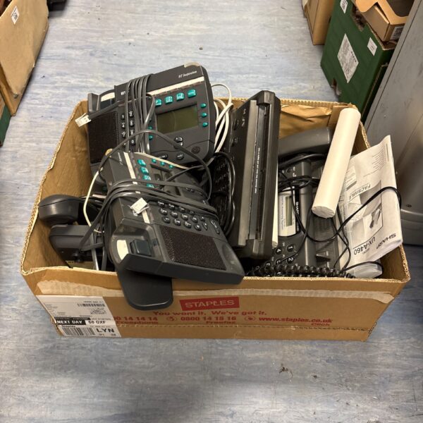 Vintage lot of telephones and machines, including BT and Sharp.