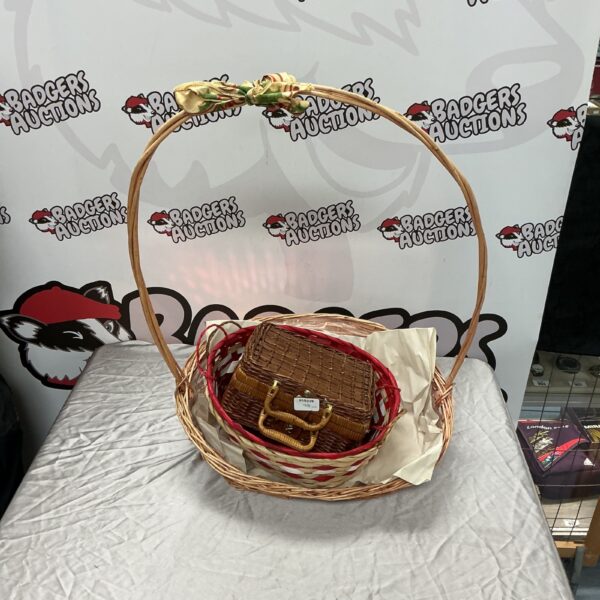 Vintage handwoven wicker basket with a sturdy handle.