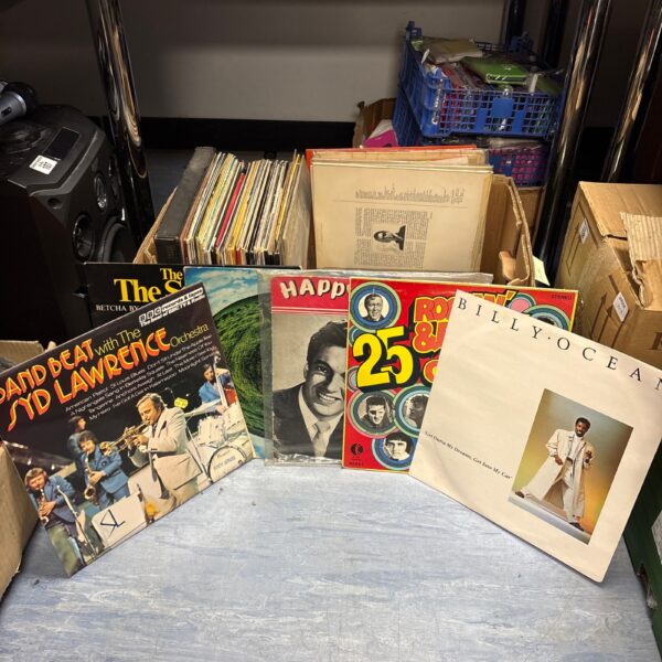 Lot of vintage vinyl records including David Bowie and The Beatles.
