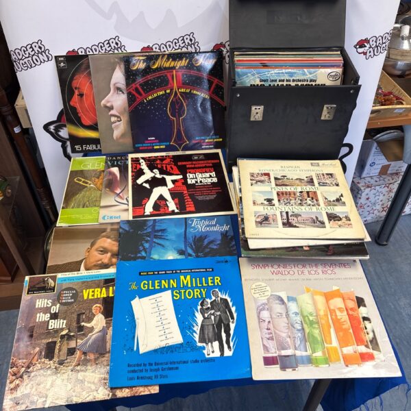 Vintage vinyl record collection featuring Glenn Miller records.