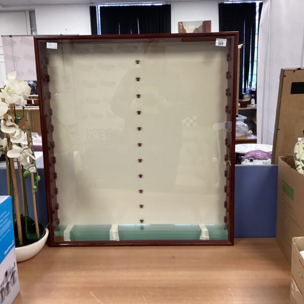 Wooden and glass display case for collectibles and diecast models.