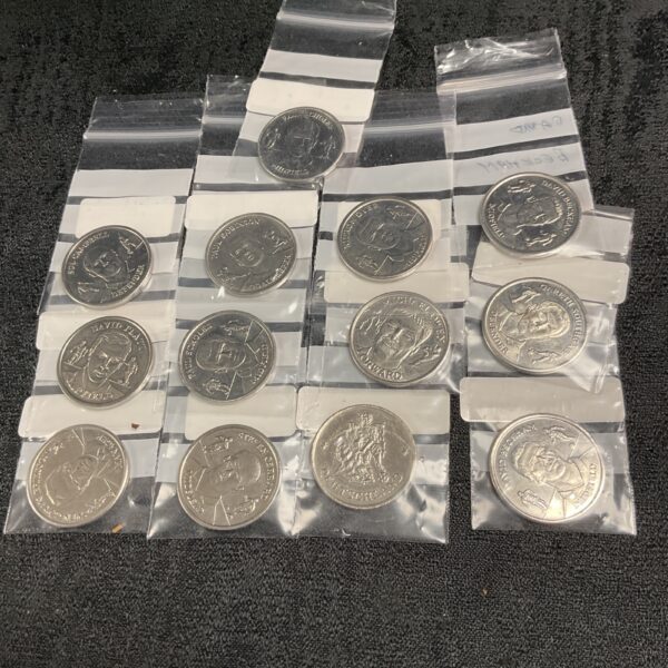 Lot of 2004 FIFA World Cup collector coins in packaging.