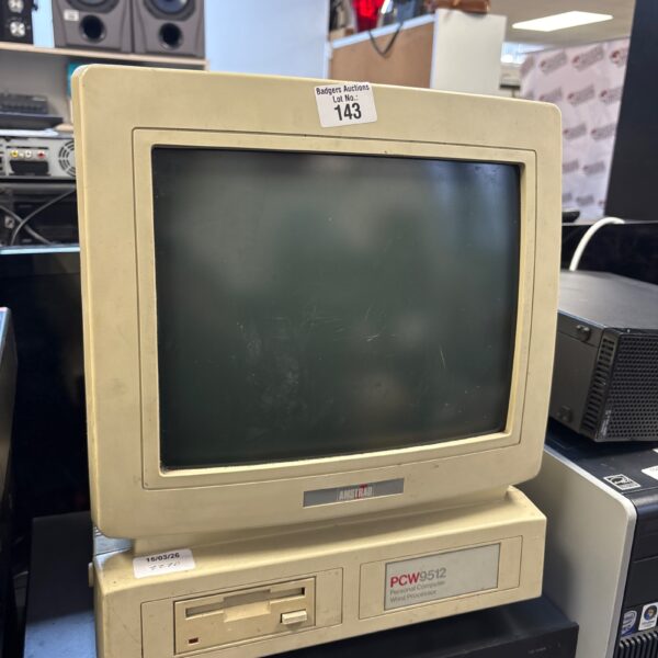 Vintage Amstrad PCW9 512 computer with integrated monitor.