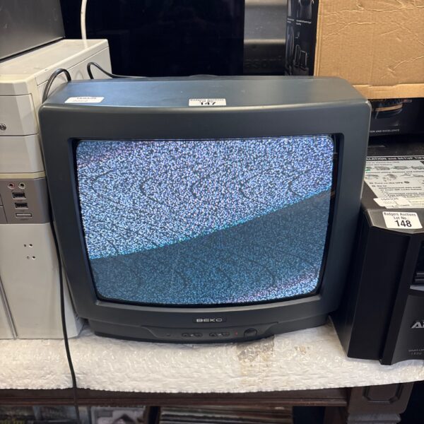 Vintage Beko colour television with CRT screen, retro design.