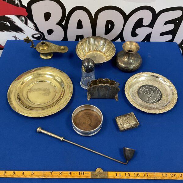Vintage brass and silverplate lot featuring a tray and candlestick.