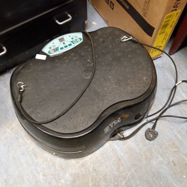 Black BTM fitness shake plate with digital control panel.