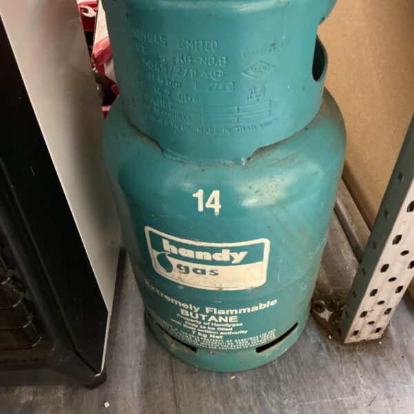 Pale blue butane gas canister for camping and outdoor use.
