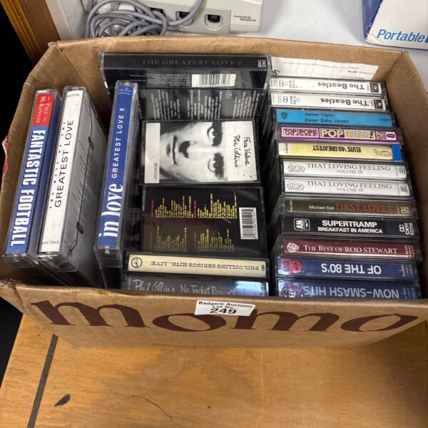 Mixed lot of vintage cassette tapes for music collectors.
