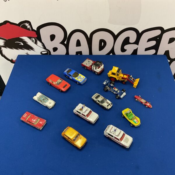 Vintage Corgi diecast model cars in a collection.