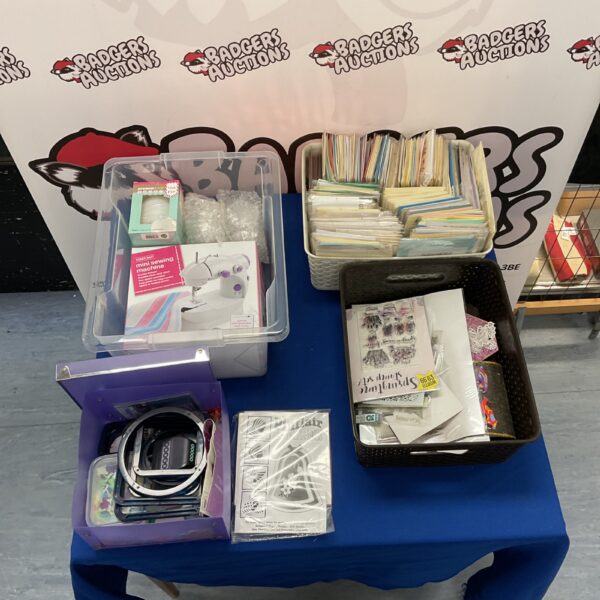 Craft lot featuring a Hobbycraft mini sewing machine and card making supplies.