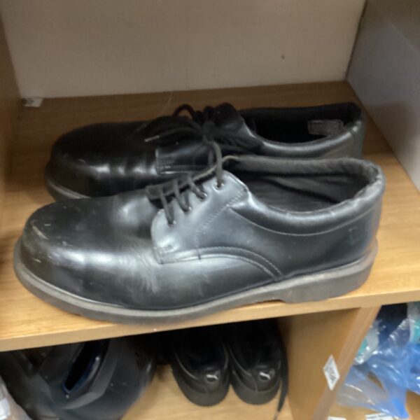 Black leather Dr Marten steel toe boots size 11 for work.