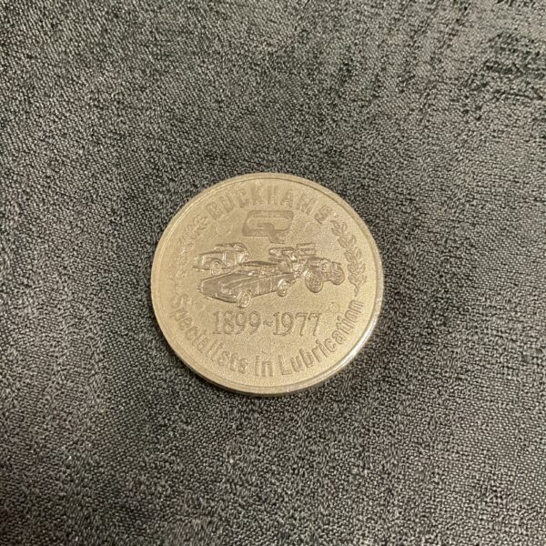 Vintage Duchams Silver Jubilee Medal 1899-1977, a collectible medal.