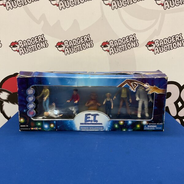 Vintage E.T. action figure collection, 1980s movie toys, collectible figures.