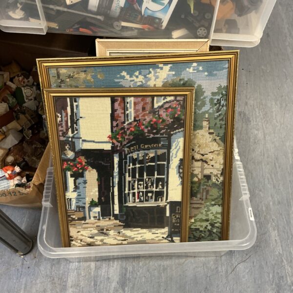 Vintage framed embroidery picture with floral details.