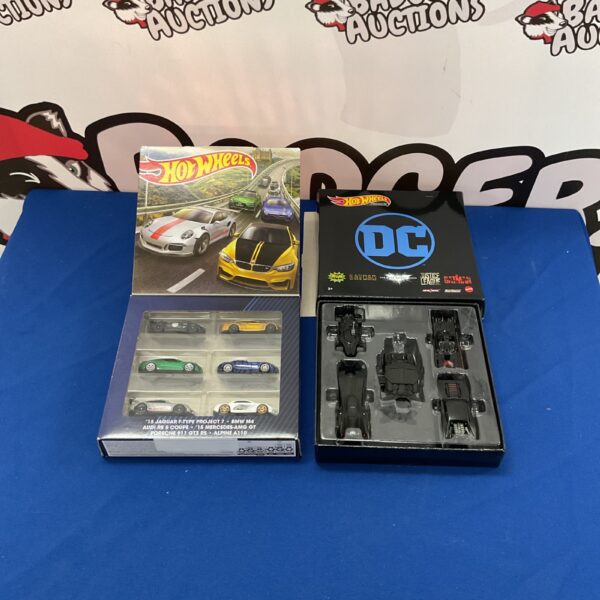Hot Wheels diecast car lot including Jaguar, BMW, Audi, Porsche and DC Batmobiles.