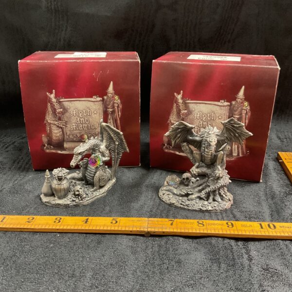 myth and magic by the Tudor mint the Dragon of the treasure and the dark Dragon