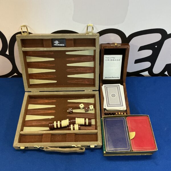 Vintage John Lewis cribbage set with wooden board and pegs.