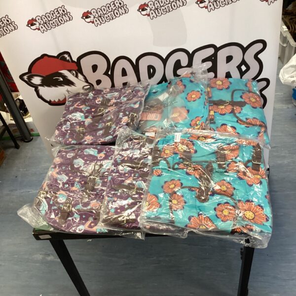 Bundle of colourful Karabars shopping bags in plastic packaging.