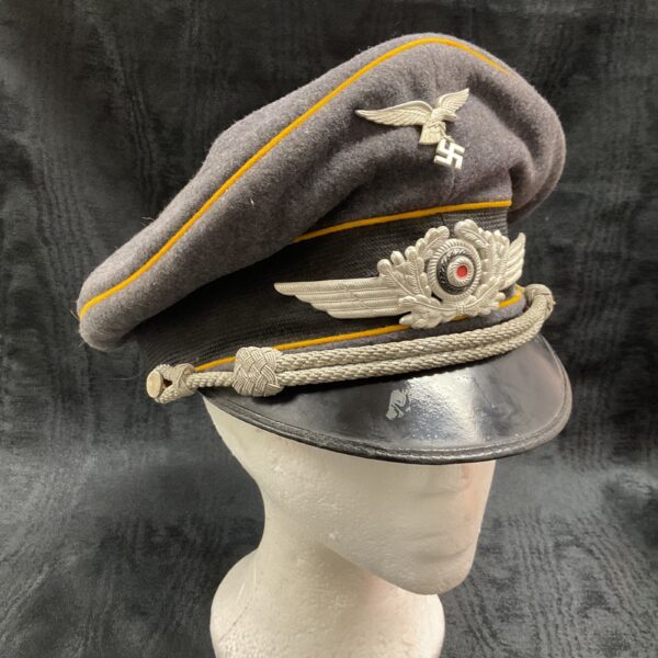 WWII German Luftwaffe officer’s peaked cap, front view.