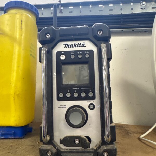 Makita DMR250Z site radio in used condition.