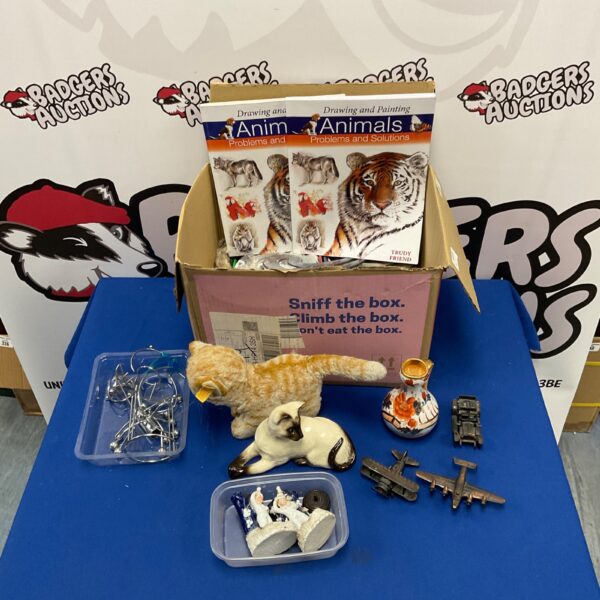 Mixed art and collectibles lot including a Royal Doulton cat figurine.