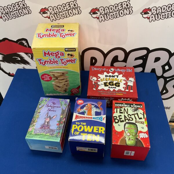 Overview of mixed book and game lot including Horrible Science and Tumble Tower.