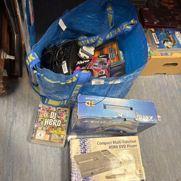 Mixed electrical lot with PlayStation 3 games and DVD player.