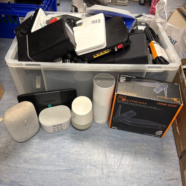 Mixed electrical lot with routers and smart speakers.