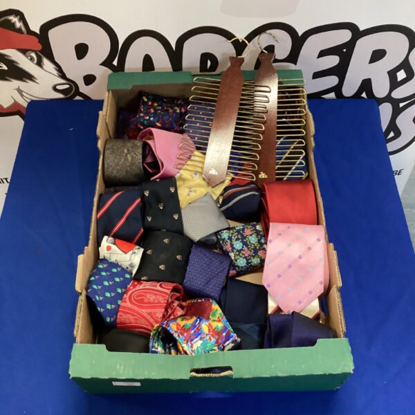 Assorted vintage ties and tie holders in a mixed lot.