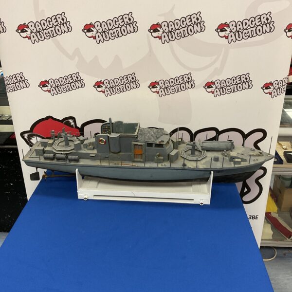 Grey hull model battleship, detailed naval ship replica.