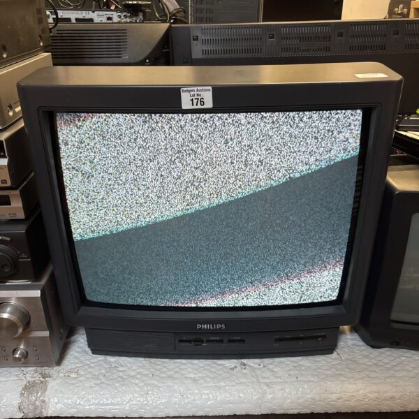 Front view of a vintage Phillips CRT television set.