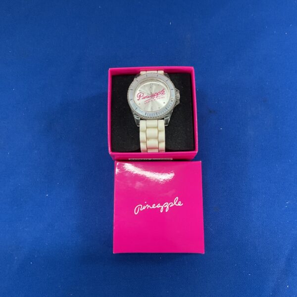 Front view of a Pineapple Dance Studios branded fashion watch.