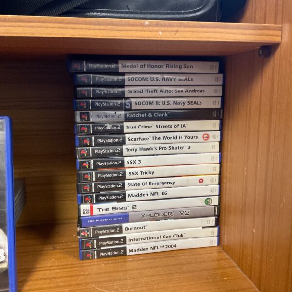 PlayStation 2 games lot including Grand Theft Auto and Scarface.