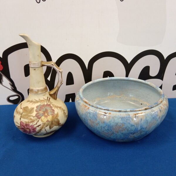 Antique Royal Worcester ewer with delicate floral painting.