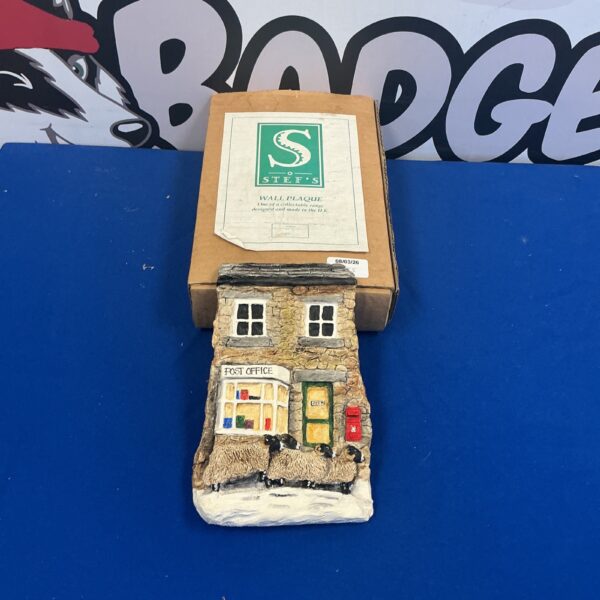 Vintage Staffs wall plaque depicting a charming post office scene.